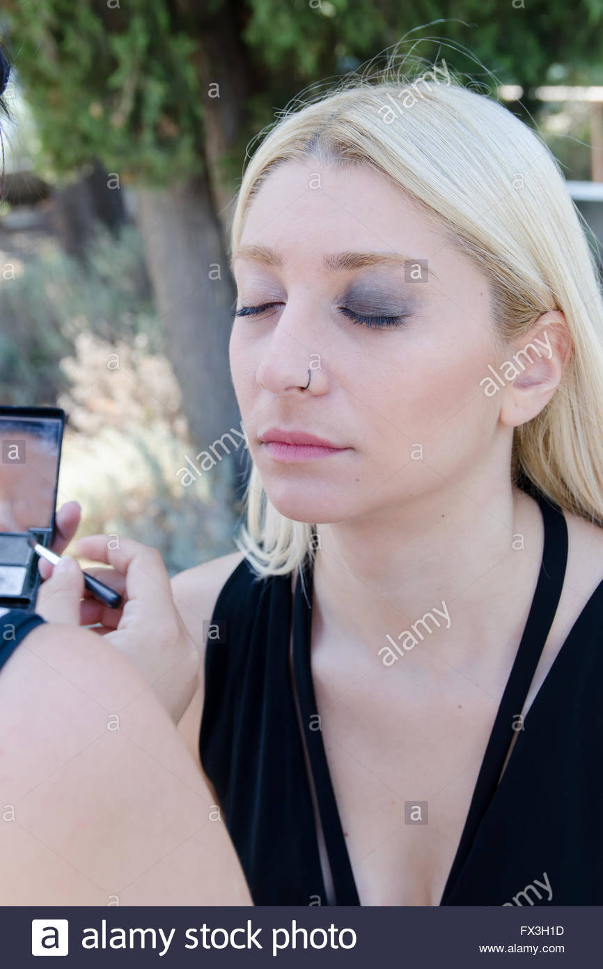 Photoshoot Eye Makeup Professional Makeup Artist Applying Make Up On A Beautiful Young